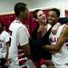 Milan team members joke with Alan Gardette in the locker room after the game against Monroe State Mary Catholic Central on Friday, Jan. 25. Daniel Brenner I AnnArbor.com